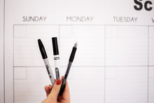 Load image into Gallery viewer, large wall calendars made of coated paper make it possible to write with permanent markers, regular markers, or pens.